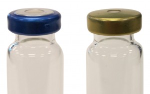 Figure 4: Left: Blue magnetic crimp cap with aluminum sides. Right: Gold all-steel crimp cap.